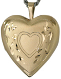 gold heart and scroll heart locket