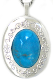 embossed locket with turquoise stone
