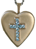 gold cross locket with aqua stones